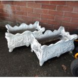 A pair of traditional style rectangular planters painted white