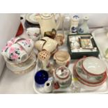 A Roslyn rose pattern tea set, 18 pieces; a Moto pottery part tea set; decorative china