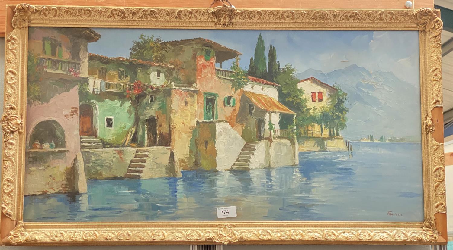 Fortini:  Italian lake scene with buildings reflected in the water, oil on canvas, signed, 39 x 80
