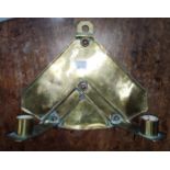 An Arts and Crafts brass and copper double candle wall sconce length 25cm