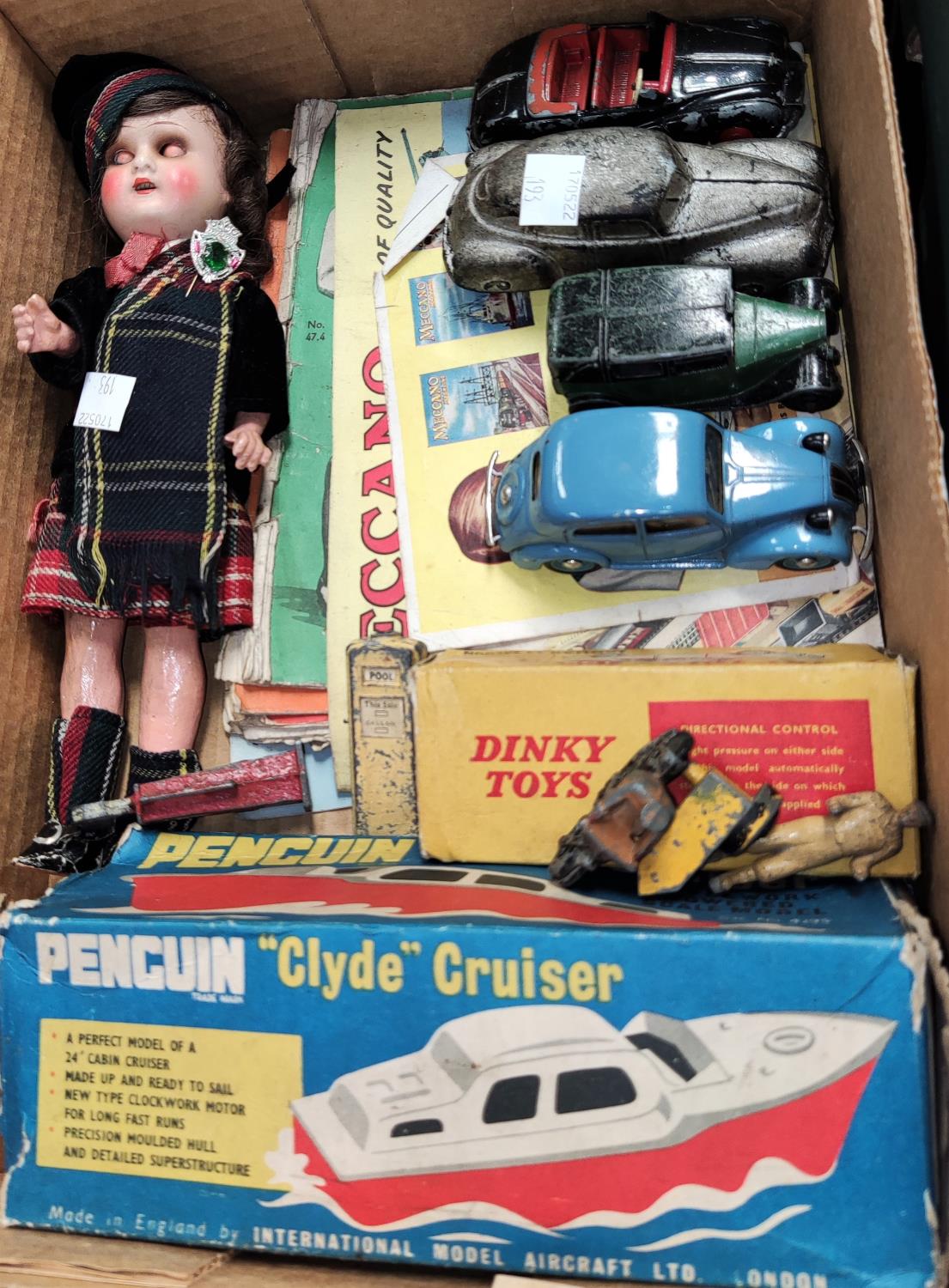 An originally boxed Dinky Jaguar 195; other unboxed cars, boxed Penguin "Clyde Cruise" (box a.f);