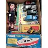 An originally boxed Dinky Jaguar 195; other unboxed cars, boxed Penguin "Clyde Cruise" (box a.f);