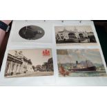 An album of vintage postcards, various military, humour etc