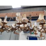 A pair of 6 branch gilt metal centre lights with acanthus decoration