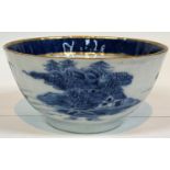 A 19th century export blue and white bowl with ribbed exterior and gilt rim, diameter 14cm