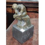 A small bronze, after Rodin 'The Thinker' on marble plinth height 19cm