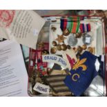 A set of 3 WWII medals 1939-45 star and medal, and Defence medal; other military badges and buttons