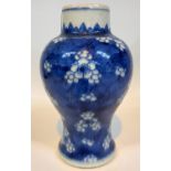 A 19th century Chinese blue and white inverted baluster vase decorated with prunus blossom, height