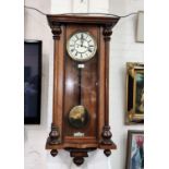 A 19th century Vienna wall clock in walnut case, with double weight driven movement (no pediment)