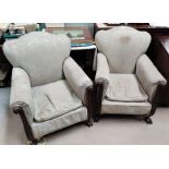 A pair of William IV style showframe armchairs with acanthus carved and scrolled front fascias in