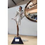 Alexander Danel:  abstract bronze sculpture of a 'high fashion' female, on marble base with silver