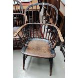 A 19th century elm Windsor armchair with stickback