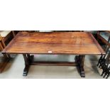 An oak period style coffee table with rectangular, on twin turned end supports