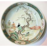 A Chinese famille verte dish decorated with traditional scene, diameter 29cm