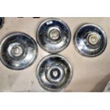 A set of 4 chrome Jaguar hub caps