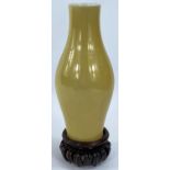 A Chinese yellow enamelled porcelain vase of ovoid form, 6 character mark to base, 17cm (Good