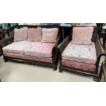 An early 20th century mahogany framed bergere 2 piece suite; a similar armchair in pink