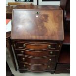 A ladies reproduction mahogany bureau with fall front and 4 drawers