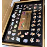 A framed set of Olympic memorabilia:  1988 US Olympic Committee, US Olympic Team Mascots Games of