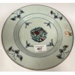 An 18th / 19th century Chinese plate with incised decoration and floral decoration with gilt