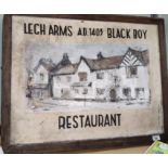 An antique pub/restaurant sign for The Legh Arms Black Boy A.D 1403 in Prestbury painted in pine