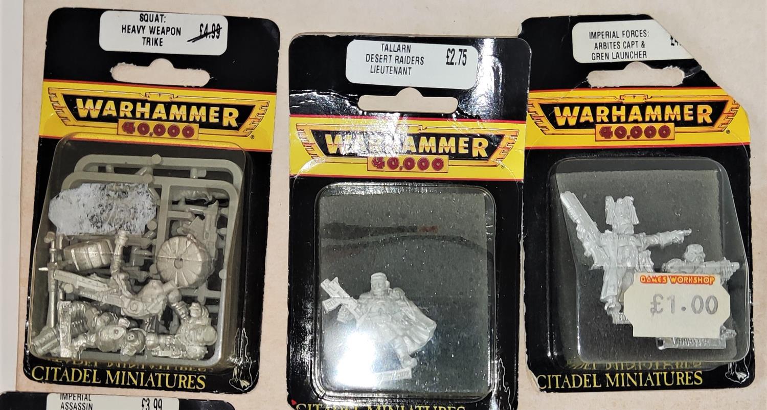 Six 1990's Games Workshop Citadel Miniature Warhammer 40,000 metal figures in blister packs,