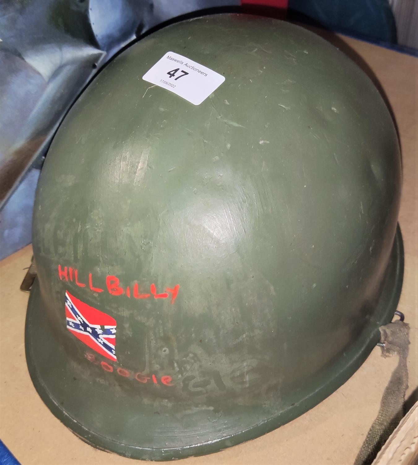 An American metal helmet from the Vietnam War period, with painted decoration; an oil painting of - Image 2 of 2