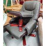 A reclining chair and matching footstool in green leatherette