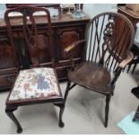 Three Queen Anne style dining chairs; a pair of Victorian mahogany dining chairs; a wheel back