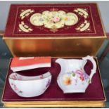 A Royal Crown Derby Posies milk jug and sugar bowl, boxed