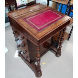 An Edwardian mahogany Davenport desk with slope front and side drawers under