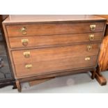 A 1950's walnut 4 height chest of drawers