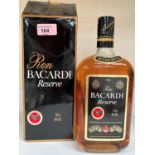 A 1 litre bottle of "Ron Bacardi Reserve"; a 70 cl bottle of "Bacardi" gold rum; a 70 cl bottle