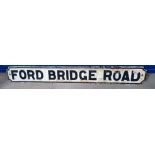 A cast iron road sign, black and white, length 108cm, Ford Bridge Road