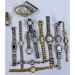 A quantity of ladies and gents vintage fashion watches