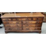 A reproduction Regency mahogany sideboard with 9 drawers