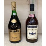 A 1 litre bottle of "Martell" cognac; a 1 litre bottle of "Hine" cognac