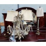 Two pairs of table lamps; a pair of standard lamps in limed finish