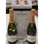 A bottle of Taittinger Reims Champagne and 2 glasses, as a boxed set; another bottle of Taittinger
