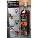 A 750 ml bottle of Old Bushmills Black Bush Irish whiskey, in vintage box with crests