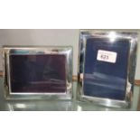 A hallmarked silver matched pair of picture frames, 15.5 x 12 cm, Sheffield 1982 & 1989