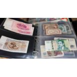 A collection of world bank notes in album
