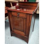 An Edwardian mahogany coal/log box with panelled fall front