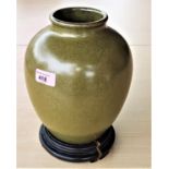 A Chinese vase with tea dust coloured glaze, incised 6 character mark to base, with associated