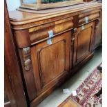 A Victorian mahogany sideboard with 2 frieze drawers and double cupboard underneath