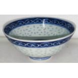 A Chinese blue and white rice bowl with rice grain effect, seal mark to base