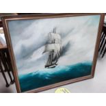 A large 20th century oil on canvas painting of a two masted ship on rolling waves 75 x 89cm