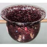 A Studio glass bowl by Malcolm Sutcliffe, with spotted red and white colouring, signed to base,