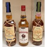 Two 70 cl bottles of "Plantation" rum; a 70 cl bottle of "Cockspur" rum