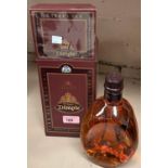 A 70 cl bottle of 15 year old "Dimple" whisky, boxed; a Royal Commemorative 70 cl decanter of